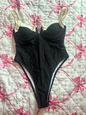 Black One-Piece Swimsuit with Cream Accents